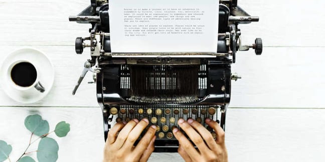 person typing a blog